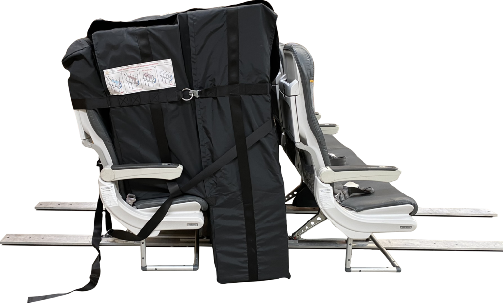 A cargo seat bag (source - colibri.aero) used to stored cargo on a passenger seat in a passenger aircraft and used in our article on preighter aircrafts - passenger aircrafts carrying cargo.