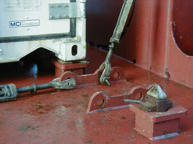 A photo showing some deck fixing points to which some lashing rodws are attached.